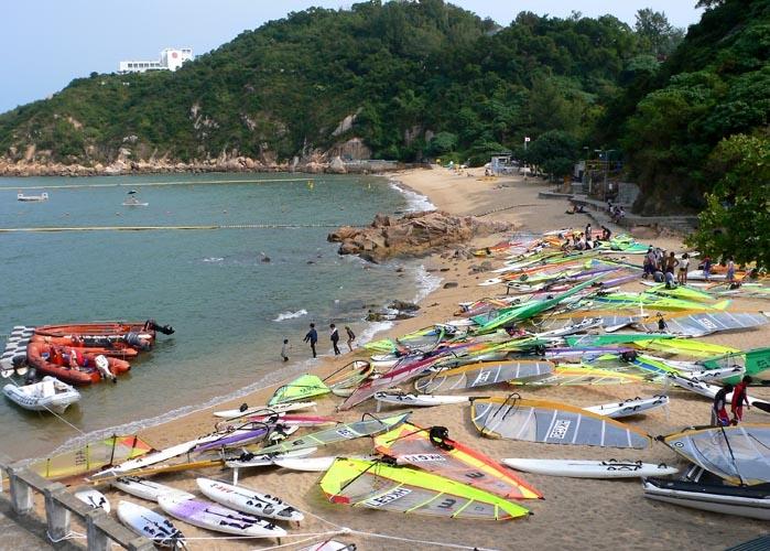 Taking a break - windsurfers on the beach, Cheung Chau island, Hong Kong.