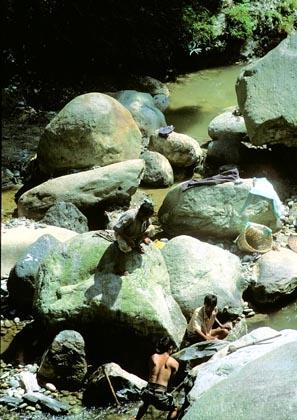 Rumtek, Sikkim, India: Workmen break rocks in the Rehpola River, near the village of Adampol.