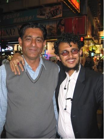 Two salesmen from Pakistan outside Chung King Mansion in Hong Kong
