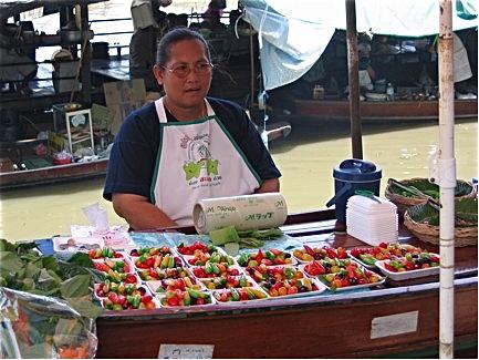 This fruit seller had a business on her boat
