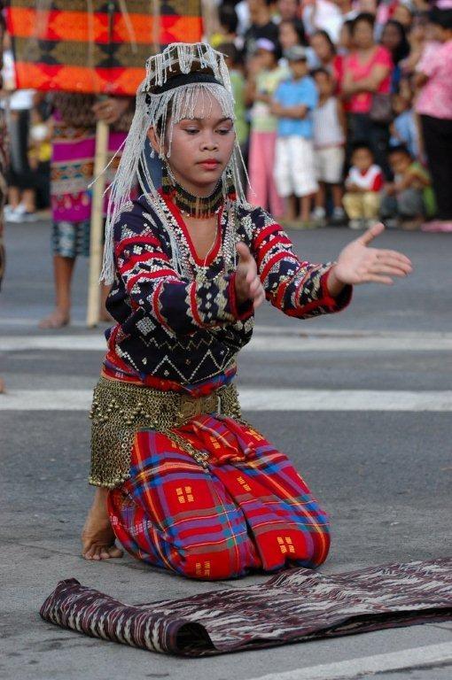 Girl with traditional mat
