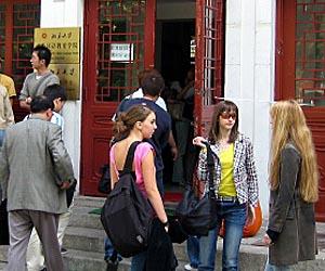 Foreign students in front of the Chinese language learning center at prestigious Beijing University.