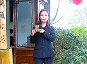 Demonstrating the proper way to brew Longjing Tea.