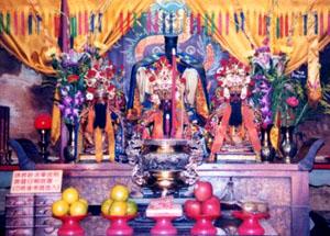 Food and incense are offered to the God of War at the Kuankung Temple Shrine, Taipei, Taiwan.