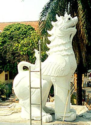The singh, or lion-dragon, typically appears sitting at entrances to a wat, including Bangkok's Wat Phra Keo. Harmless to humans, the singh inhabits the mythical forest Himaphan, a place of never-ending rice.