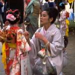 Every year on November 15, Japan celebrates Shichi-Go-San--Children's Day. Dressed in their very finest garments, girls and boys aged three, boys aged five, and girls aged seven, go with their families to nearby shrines, where they line up, sometimes for hours, to await their turn to be blessed by the presiding priest. After the blessing, the child is presented with a gift of long sticks of candy called chitose-ame, "thousand year sweets," wrapped in ornate bags decorated with cranes and turtles, both symbols of longevity.