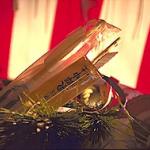 The New Year is Japan's most important celebration. At this time, the people of Japan visit shrines and temples to pray for blessings in the year to come. Families gather to enjoy specially prepared foods called O-sechi, and to exchange seasonal gifts. One traditional New Year's gift is a symbolic arrow to ward off bad fortune in the coming year.