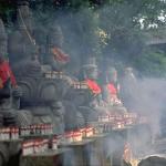 In the heart of Gunma Prefecture near Mt. Haruna, is the ancient temple known as Mizusawa, dedicated to Kannon, the goddess of mercy. Amid a cloud of incense, this visitor offers a prayer to the images of Fudosan, the patron saint of suffering.