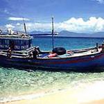 Fishing launch beached on an island off Doc Let