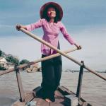 A woman in Can Tho rows across the Can Tho River which flows into the Hau Giang or Lower River, one of two main branches of the Mekong that runs through Viet Nam after the river splits in Cambodia. Can Tho is considered the political, economic, transportation and cultural center of the Mekong Delta.