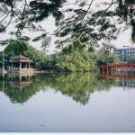 The Huc Bridge and Den Ngoc Son Temple, Hoan Kiem Lake, Hanoi, Vietnam.