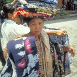 Sarong vendor, "Cheap price for you, Boss."