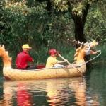 Boating on the lake, in Black Dragon Pool Park. Lijiang, Yunnan, China.
