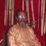 Naxi musician, in Lijiang Old Town. Lijiang, Yunnan, China.