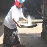 Woman preparing rice for a wedding feast in Bali. 