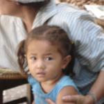 Vendor’s child. Phnom Penh, Cambodia.