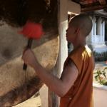 Novice Monk Banging Temple Drums