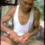 Orong Asli, blow pipe making, Lake Chini, Malaysia.
