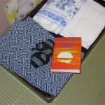 Neatly folded kimonos and the Buddhist Scriptures were provided in our ryokan