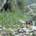 Boat trackers pull a boat through the gorge