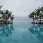 “Melding tiers of palm-fringed infinity pools finally fuse into the South China Sea.” (Photo courtesy of The Nam Hai. Used with permission.)