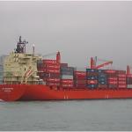 A ship comes into the Hong Kong container port