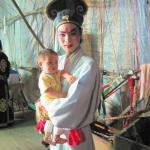 Backstage with a Chinese opera troupe in Penang, Malaysia    This baby’s bed is a backstage bassinet, and he has already heard more Chinese operas in his short lifetime than most of us ever will.