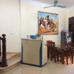 This is the main floor, also the living room. The picture on the wall was painted by talented Mr. Viet, the owner of the house