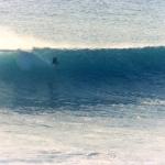 Riding the waves at Ulu Watu, Bali, Indonesia. The outside corner. (just outside the cave: sequence one) Surfer: unknown.