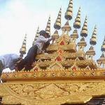 Workers restore Wat In Peng, one of Vientiane's many temples. Authorities now acknowledge the central role of Buddhism in the people's lives.
