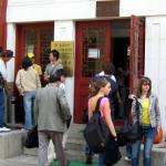 Foreign students gather in front of the Chinese language learning center at prestigious Beijing University, in Beijing 29 September 2004. China is expecting a record number of students to enrol in its universities this year as foreigners seek to cash in on the country's booming economy by becoming proficient in Mandarin, and of the anticipated 86,000 foreign students, an overwhelming number will come from Asian countries with close economic, trade and cultural ties with Beijing.