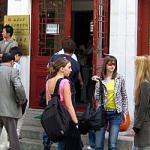 Foreign students in front of the Chinese language learning center at prestigious Beijing University.