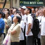 Watching the World Cup in Hong Kong's Times Square. Rated as one of the top 10 tourist attractions by the Hong Kong Tourist Association, Times Square is a 2 million square foot office and retail complex in bustling Causeway Bay. It is Hong Kong's most popular mall. On an average weekend over 135,000 visit its 350 shops, 18 restaurants, four-screen cinema and basement food court.