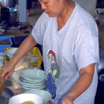Tim from Lamduan Faham Kao Soi shop serving up Chiang Mai?s famous noodle soup.