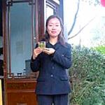 Demonstrating the proper way to brew Longjing Tea.