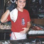 It's nice and fresh, promises the young fishmonger. And he's probably right. The fish at the market comes straight from the fishing harbour at Phuket Town.