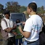 OI Staff Dani Sirait talking with Mr. Abdusallam, Chief of the Rimajeneu Village in Aceh Besar district, Aceh, one of the worst areas hit by tsunami.