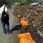 Bodies on the street of Rimajeneu village, Aceh Besar District, Aceh, one of the worst areas hit by tsunami with 80% of villagers dead and missing. Many children orphaned from this village are now living on the mountain.