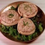 Pastry tarts filled with cream cheese and crab.