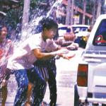 Water fight, Bangkok, Thailand. For Songkran celebrations to welcome the Thai Buddhist New Year, Bangkok residents take to the streets in friendly water battles. This is one of the best times to visit Bangkok if one does not mind getting wet.