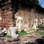 Exterior wall of an old palace in Ayutthaya. Note the beautiful statues carved onto the walls. These statues are in dire need of restoration, many are already showing signs of severe damage.