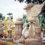 Phimai, Thailand: The sculptures represent the usual figures of Buddhist mythology: erawans, celestial dancers, sitting Buddhas, chokras, and multi-tiered parasols. From a distance, the life-size human forms are startlingly life-like, while the other sculptures are as dazzling as chandeliers.
