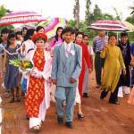 The wedding procession to the bride's house. Vietnamese weddings are far more participatory than traditional western weddings.