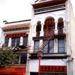 With its arches, columns, and recessed balconies, this building is typical of those found in Chinatown at the turn of the twentieth century.