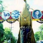 Like this one over Huay Kaew Road in Chiang Mai, murals containing photographs of H.M. the King and his family sprout up or are refurbished prior to his birthday each year. They usually depict H.M. performing various good deeds.