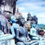 These small Buddhas sit at the feet of their big brother. Although they may give the impression of ancientness, in fact this is the effect of the bombings that destroyed the temple and subsequent weathering.