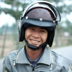 Even the cops wear a smile, in downtown Hanoi.