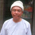 A shopkeeper in the Old Quarter.