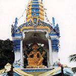 One common variation on the spirit house looks like a miniature Khmer-style temple, and houses a four-faced image of Brahma, the Hindu creator-god, together with his bird-vehicle and thunderbolt.