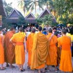 Monks at Wat Sop in Luang Prabang gather to watch a puppet show.